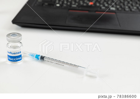 インフルエンザワクチンと注射器。 ワクチン接種イメージ インフルエンザワクチンと注射器。 ワクチン接種イメージ 78386600