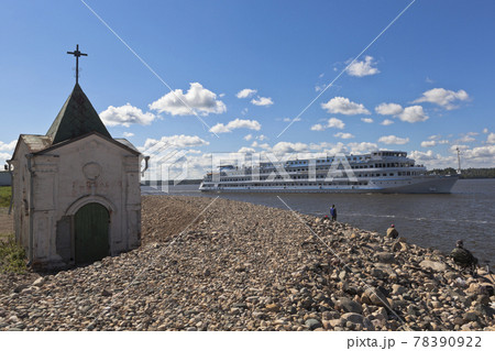 Passenger ship Maxim Litvinov passes near Goritsky Voskresensky monastery on the Sheksna River in Vologda Region, Russia Passenger ship Maxim Litvinov passes near Goritsky Voskresensky monastery on the Sheksna River in Vologda Region, Russia 78390922
