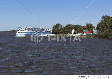 River cruise ship "Alexander Green" at the pier in village Goritsy in Vologda Region River cruise ship "Alexander Green" at the pier in village Goritsy in Vologda Region 78390924
