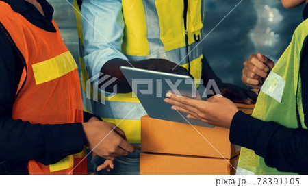 Warehouse worker working together in the storehouse 78391105