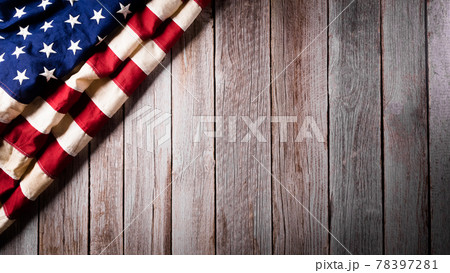 4th of July happy independence day concept. Vintage American flag on old wooden background. 78397281