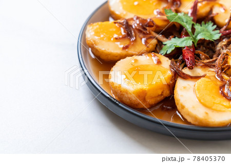 Fried Boiled Egg with Tamarind Sauce 78405370