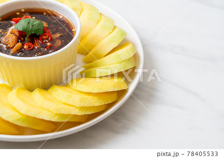 fresh mango with sweet fish sauce dipping fresh mango with sweet fish sauce dipping 78405533