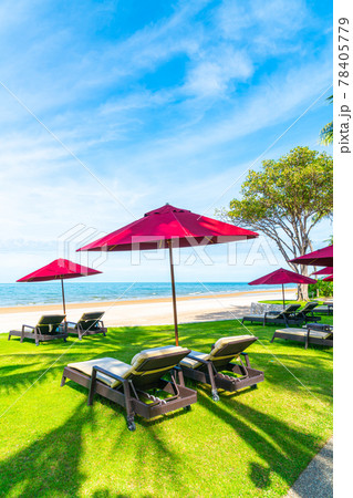 beach chair and umbrella with sea beach background 78405779