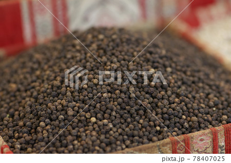 Black round pepper on counter of market Black round pepper on counter of market 78407025