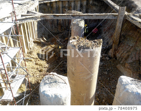 SELANGOR, MALAYSIA - JANUARY 15, 2017: Foundation work include the building piling works and pile cap construction at the construction site. Heavy construction work with full awareness about workers s SELANGOR, MALAYSIA - JANUARY 15, 2017: Foundation work include the building piling works and pile cap construction at the construction site. Heavy construction work with full awareness about workers s 78408975