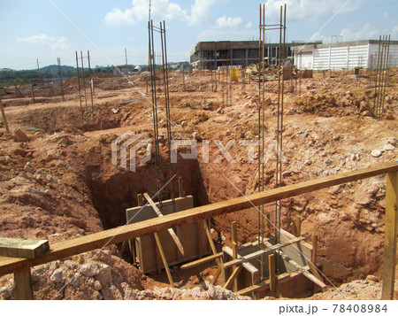 SELANGOR, MALAYSIA - JANUARY 15, 2017: Foundation work include the building piling works and pile cap construction at the construction site. Heavy construction work with full awareness about workers s 78408984