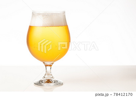 Glass of cold golden beer isolated on a white background 78412170