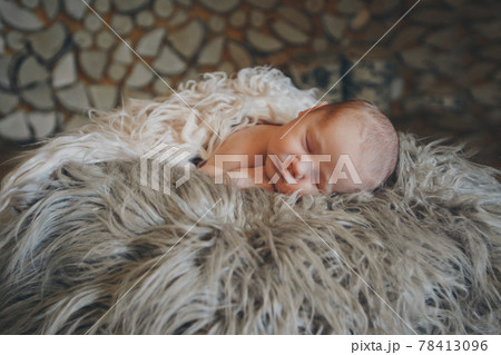 Portrait of newborn baby on a white background. 78413096