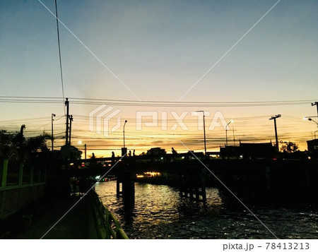Bridge walking path cross Khlong Saen Saeb on night time, main canal transport in Bangkok, Sunset scene 78413213