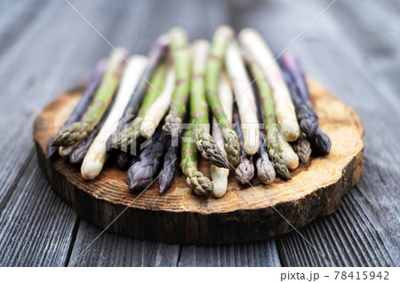 Green, purple and white asparagus sprouts Green, purple and white asparagus sprouts 78415942