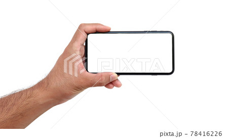 Female hand holding a black cell phone with white screen isolated on white background 78416226