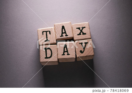 Tax Word with Wooden Cubes Tax Word with Wooden Cubes 78418069