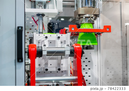 Automatic blow molding machine: manufacturing of empty green plastic jerrycans Automatic blow molding machine: manufacturing of empty green plastic jerrycans 78422333