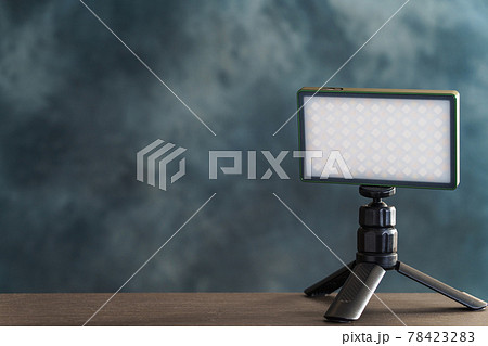 Mini LED light for videography on shelf 78423283
