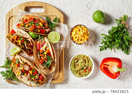 tacos with grilled chicken meat and veggies tacos with grilled chicken meat and veggies 78423825