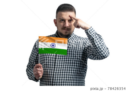White guy holding a flag of India and a finger touches the temple on the head isolated on a white background 78426354