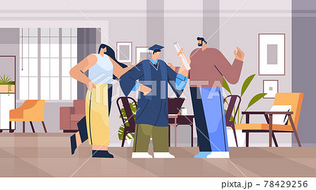 Parents congratulating son student graduate celebrating academic diploma degree education university certificate 78429256