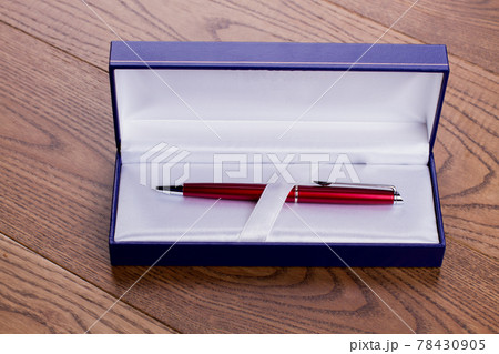 Pen as a present in a gift box. Pen as a present in a gift box. 78430905
