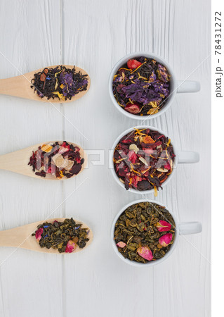 Different types of dry tea on white background. Different types of dry tea on white background. 78431272