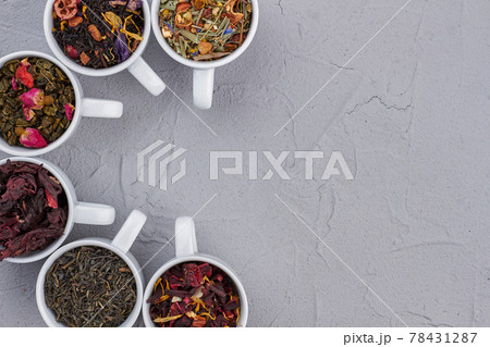 Collection of cups with dry tea, copy space. Collection of cups with dry tea, copy space. 78431287