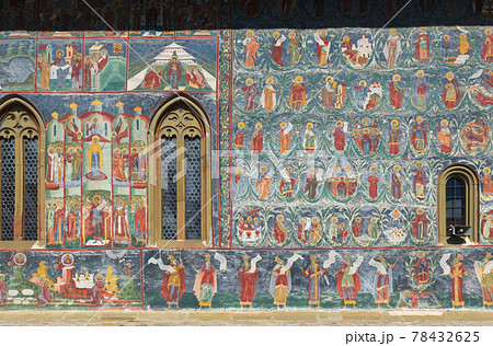 Church of Sucevita Monastery and frescoes on outer wall of it Church of Sucevita Monastery and frescoes on outer wall of it 78432625