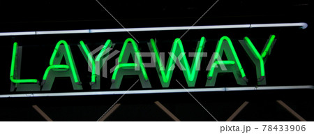 Vintage Neon Sign in Window of Pawn Shop 78433906