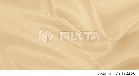 Smooth elegant golden silk or satin luxury cloth texture as wedding background. Luxurious background design. In Sepia toned. Retro style 78452256