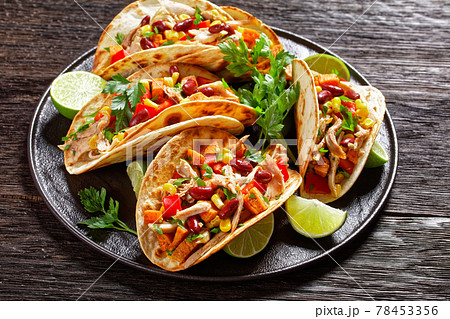 tacos with grilled chicken meat and veggies 78453356