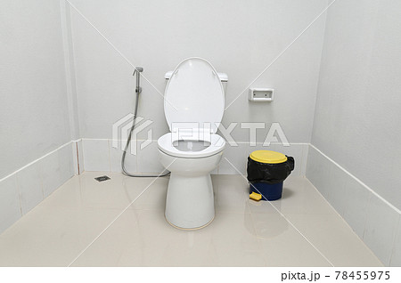 White flush toilet in modern bathroom interior White flush toilet in modern bathroom interior 78455975