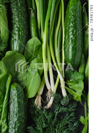 Close up Green vegetables, dark leafy food background. 78461765
