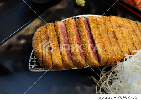 Fried crispy beef Gyukatsu steak served with rice 78467755