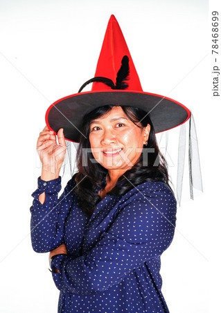 Asian women with Haloween red hat on white background. Asian women with Haloween red hat on white background. 78468699