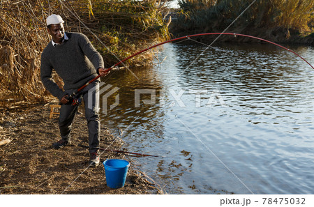 Emotional portrait of African fisherman 78475032