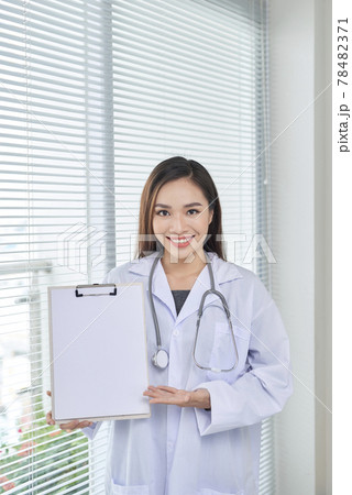 concerned medical doctor with stethoscope showing on empty blank concerned medical doctor with stethoscope showing on empty blank 78482371