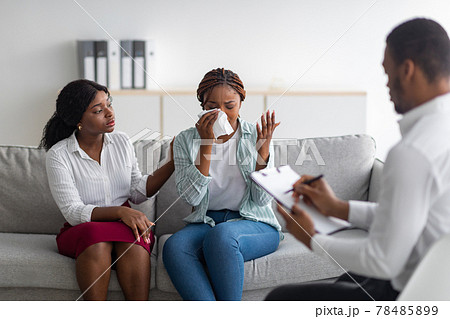 LGBT lesbian couple consulting phychologist at medical office. Homosexual marriages problems LGBT lesbian couple consulting phychologist at medical office. Homosexual marriages problems 78485899