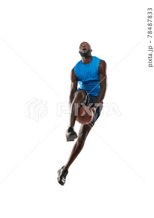 Full length portrait of a basketball player with a ball isolated on white studio background. advertising concept. Fit african american athlete jumping with ball. 78487833