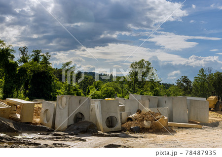 Construction of concrete pipe of drainage system work on the road for drained water sewer 78487935