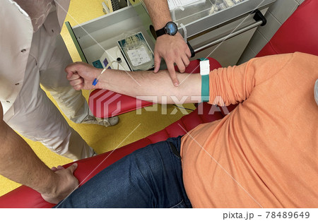 Close up nurse hand collecting blood sample for diagnosis covid-19, Coronavirus. Close up nurse hand collecting blood sample for diagnosis covid-19, Coronavirus. 78489649