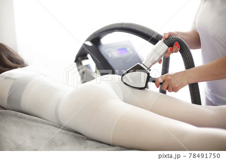 Crop woman having lipomassage in salon 78491750