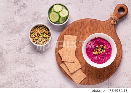 Roasted Beet Hummus in a bowl. Roasted Beet Hummus in a bowl. 78493113
