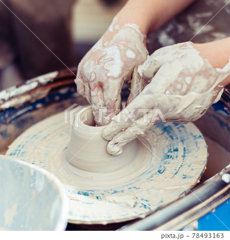 Master of pottery creates shapes from clay Master of pottery creates shapes from clay 78493163