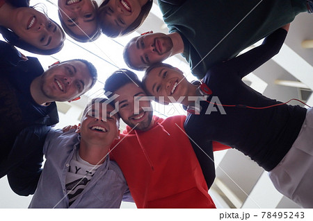 group of happy young people showing their unity group of happy young people showing their unity 78495243