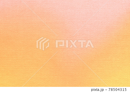 アプリコットとオレンジのグラデーションに染めたナチュラルなキャンバスの背景の写真素材