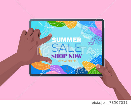 african american human hands using tablet pc with summer sale banner flyer or greeting card on screen 78507031