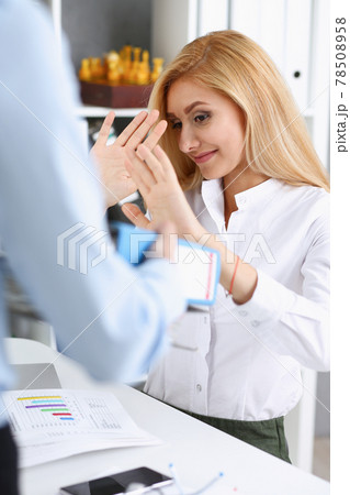 Female employee show pack of documents to manager Female employee show pack of documents to manager 78508958