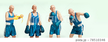 Senior man wearing sportwear boxing isolated on studio background. Concept of sport, activity, movement, wellbeing. Copyspace, ad. Senior man wearing sportwear boxing isolated on studio background. Concept of sport, activity, movement, wellbeing. Copyspace, ad. 78510346