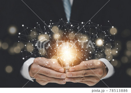 New Target business with light bulb concept, Business holding light bulb New Target business with light bulb concept, Business holding light bulb 78513886
