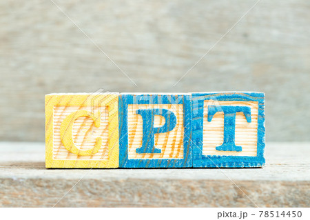 Color alphabet letter block in word CPT (Abbreviation of Carriage Paid To) on wood background Color alphabet letter block in word CPT (Abbreviation of Carriage Paid To) on wood background 78514450