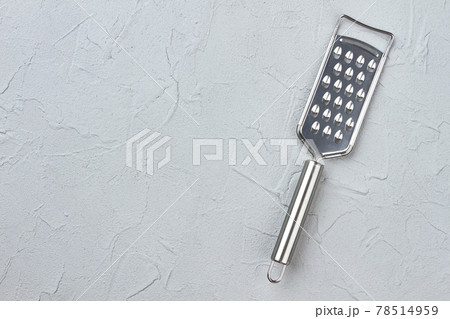 Cheese grater and copy space. Cheese grater and copy space. 78514959